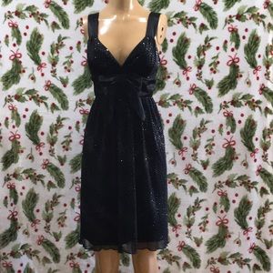 Black chiffon with satin bow accent glitter dress